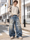 Front view of style 826015 paint-splatter wide-leg jeans